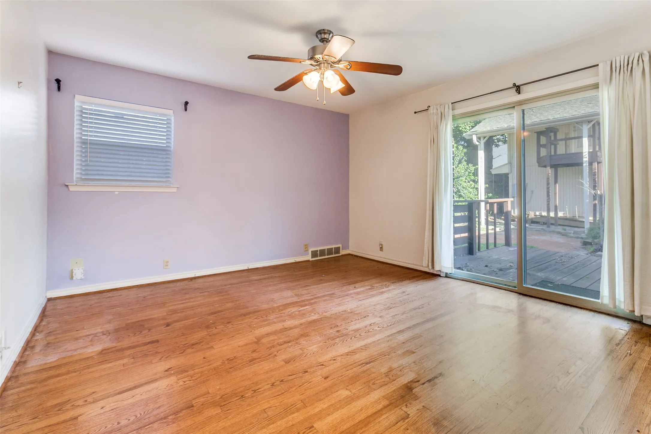 Sliding doors offer access to backyard.