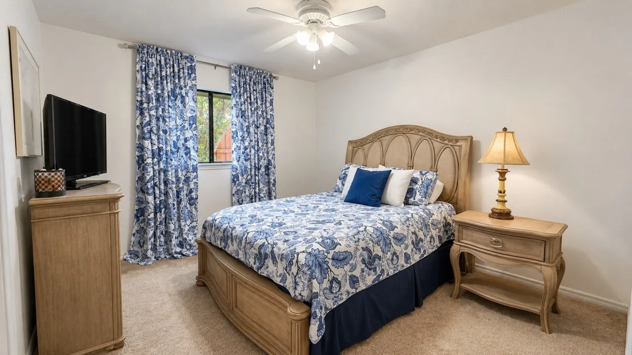 Guest bedroom with en suite bath and walk in closet.