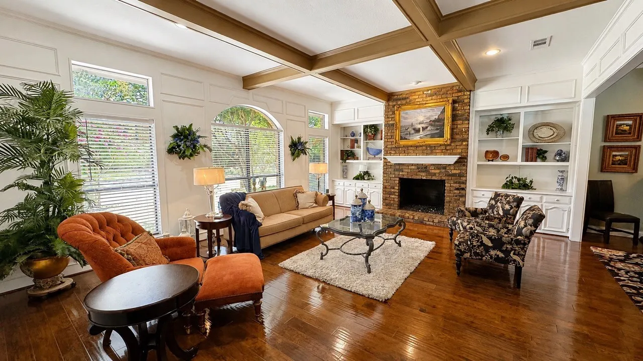 The living room is open to the dining room....glimpse on the right.