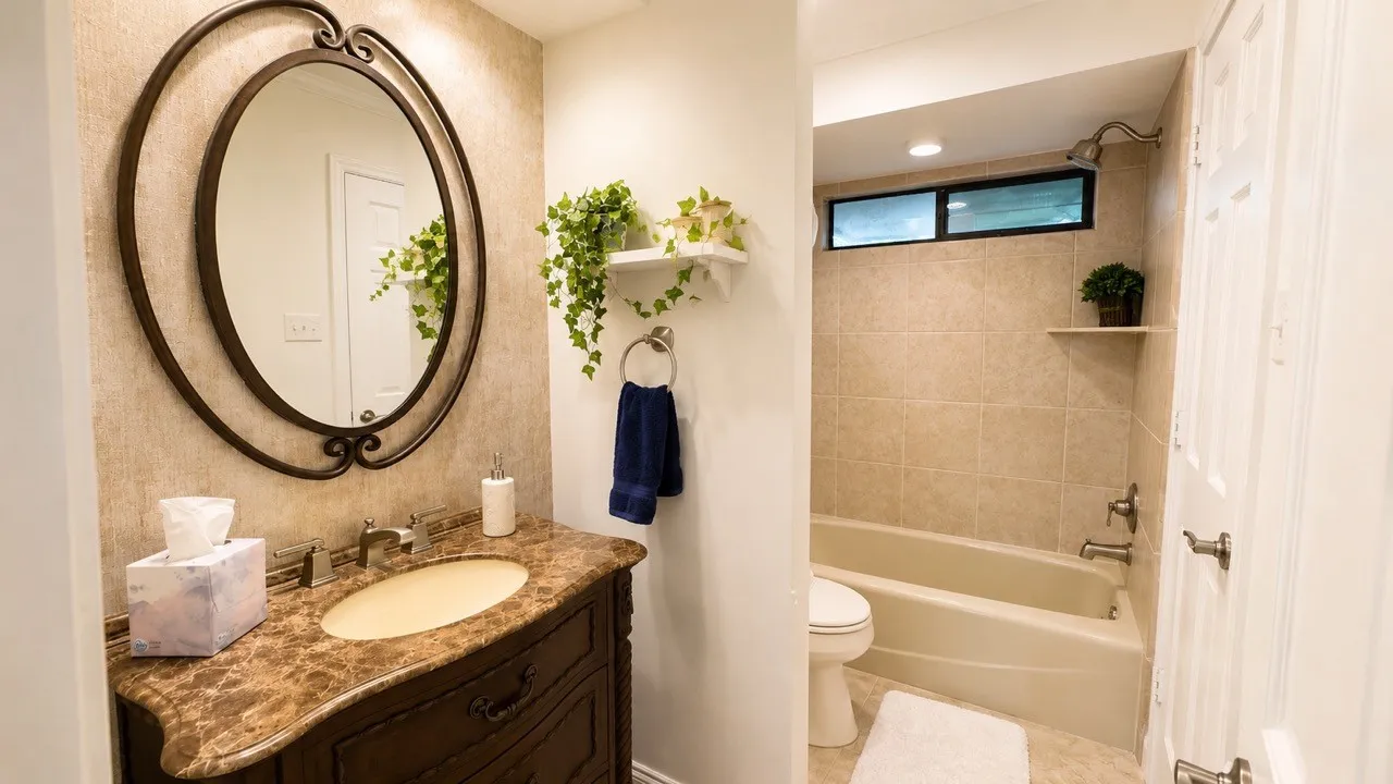 This bathroom is the guest bedroom en suite with access to the hallway.