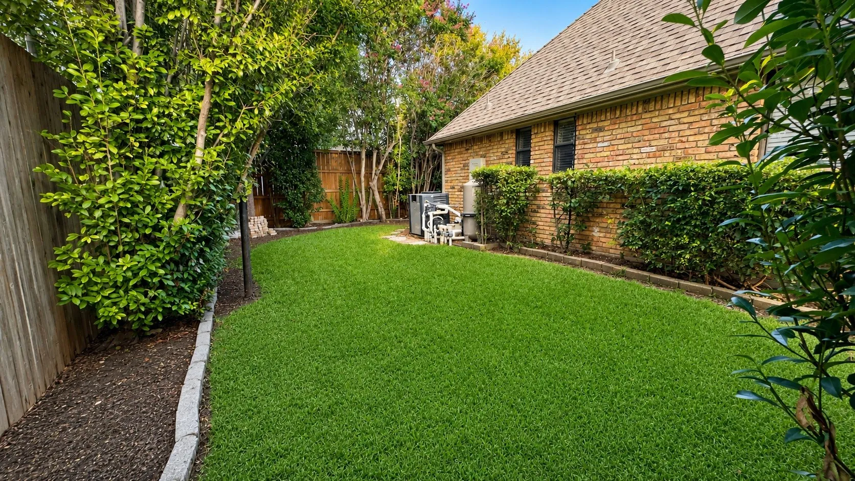 Grassy side yard for kids and pets!