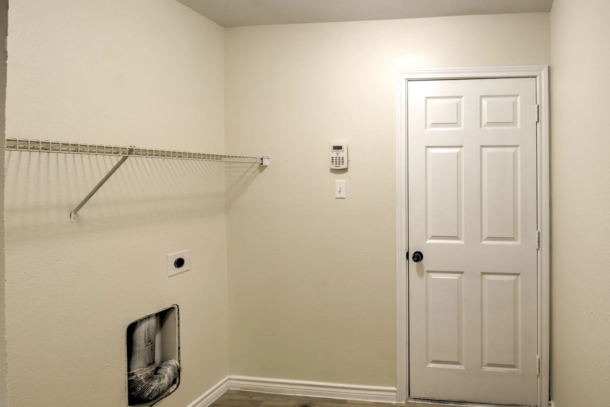 Laundry leading into the garage.