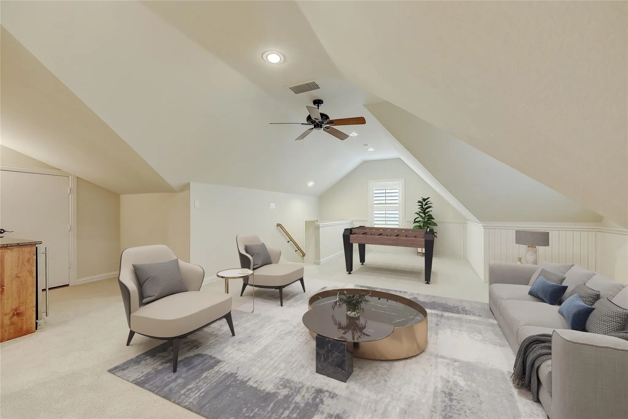 Attic living space featuring a sloped ceiling, recessed lighting, and a ceiling fan