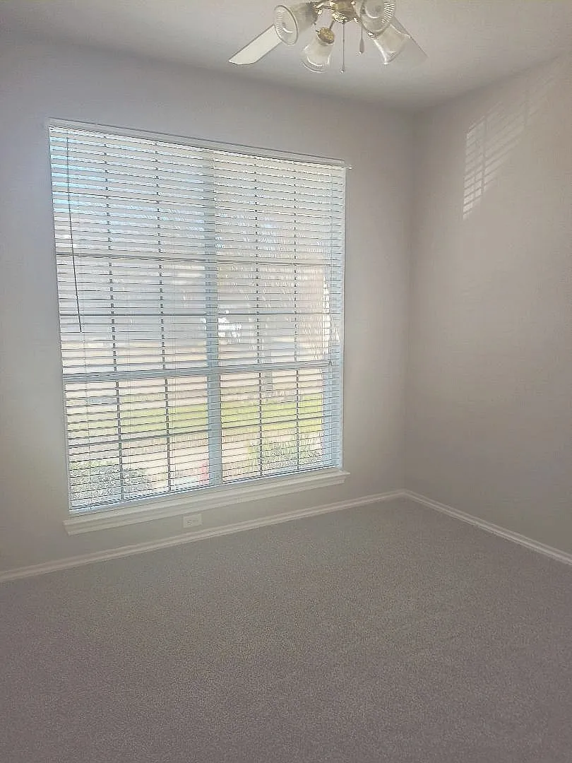SPLET FRONT BEDROOM WITH LARGE WINDOW