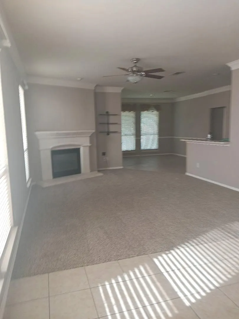 GREAT ROOM OPENS TO KITCHEN AND BREAKFAST EATING AREA