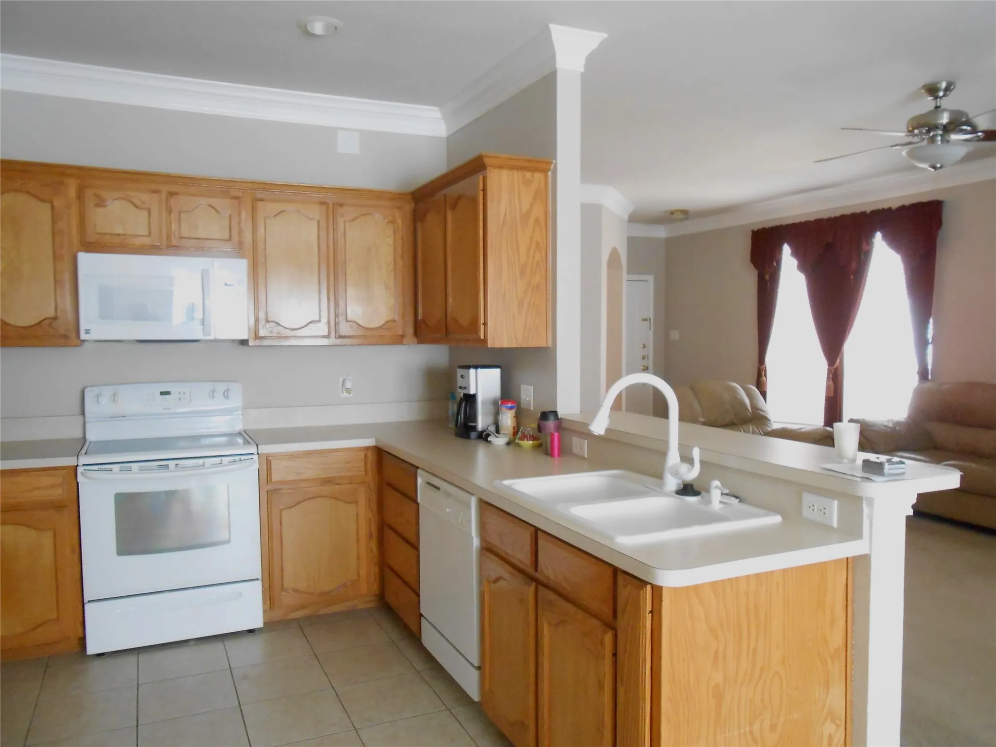 KITCHEN OPENS INTO THE FAMILY AREA
