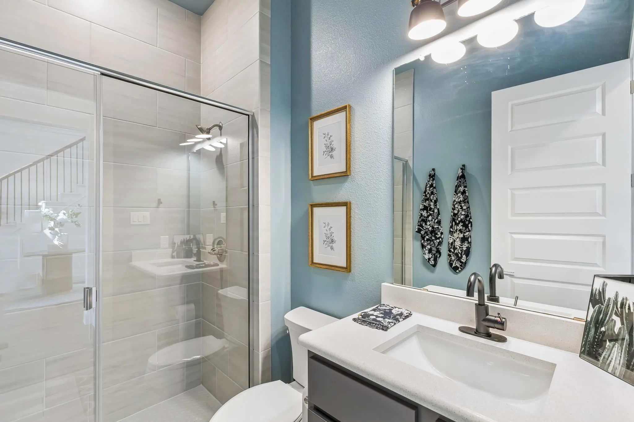 First floor bathroom located right outside the guest room.