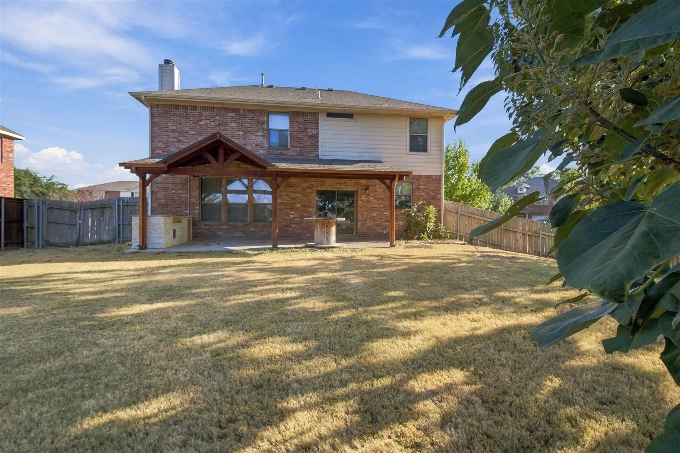 Expansive backyard with a full privacy fence