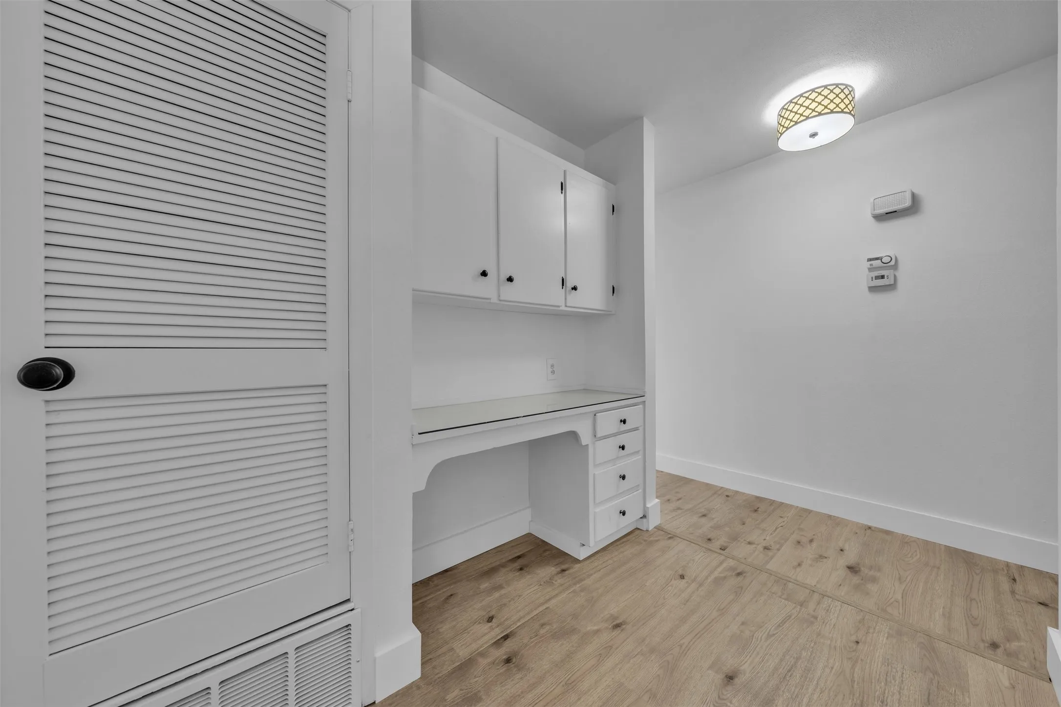 Convenient Built in Desk Area Leading to the Bedrooms