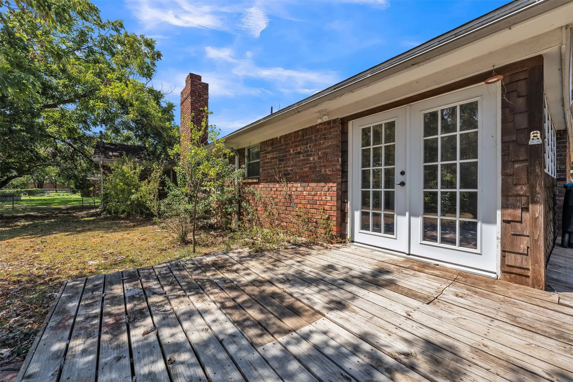 French Doors Leading Out to Back Yard Deck
