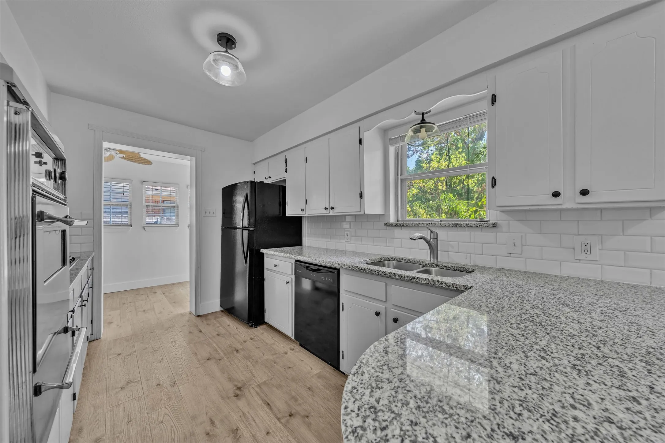 Inviting Kitchen with Lots of Counter Space and Cabinets