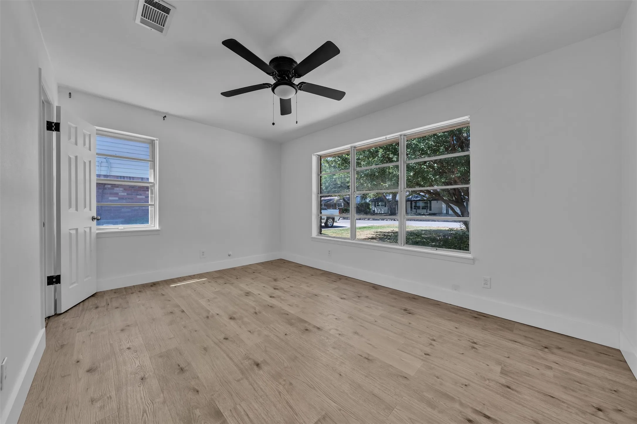 Front Bed Room with Plenty of Sunlight and Space