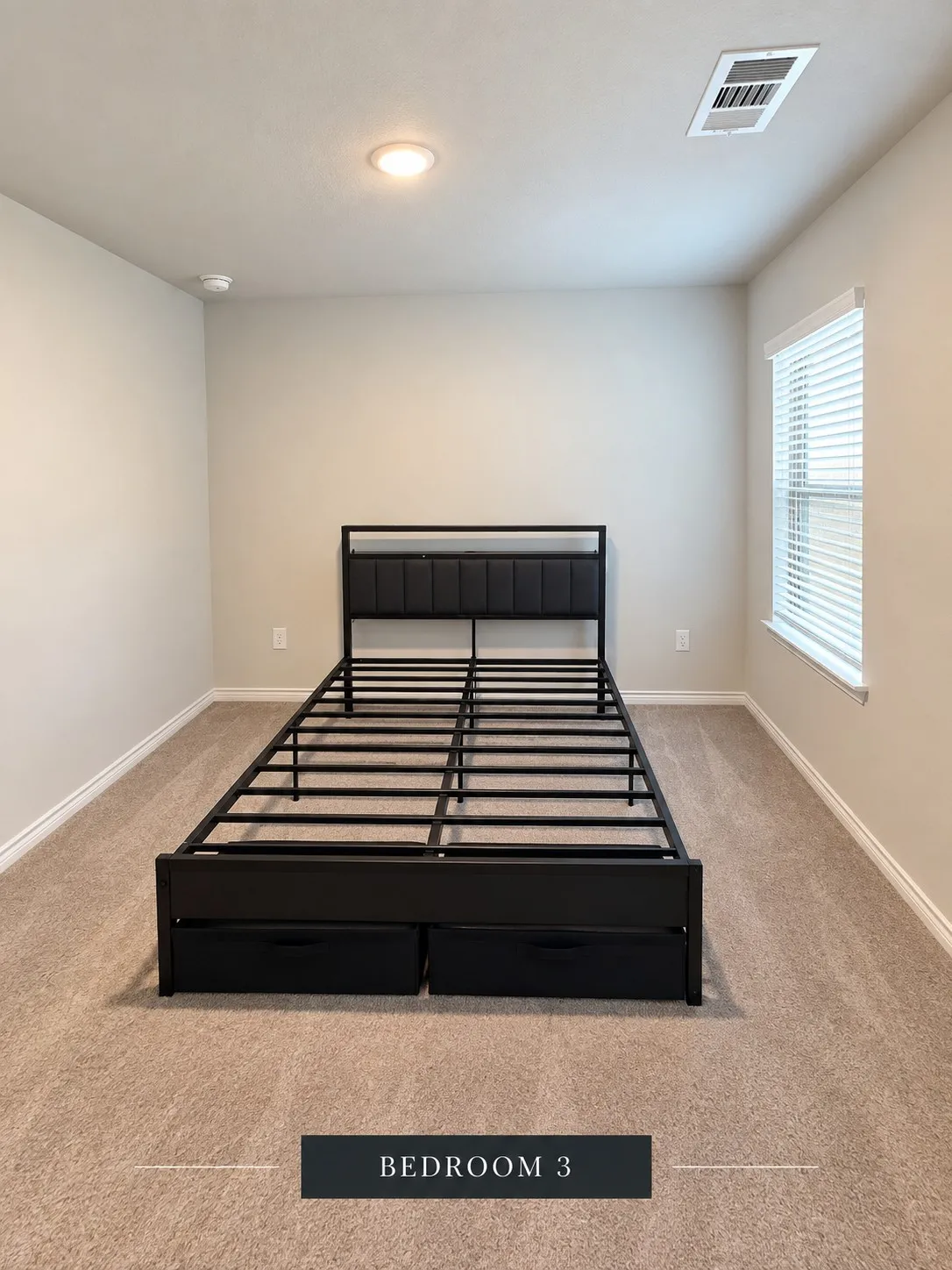 Bedroom #2 - Neutral tone wall paint, recessed ceiling light, window with blinds, and light-toned carpet flooring