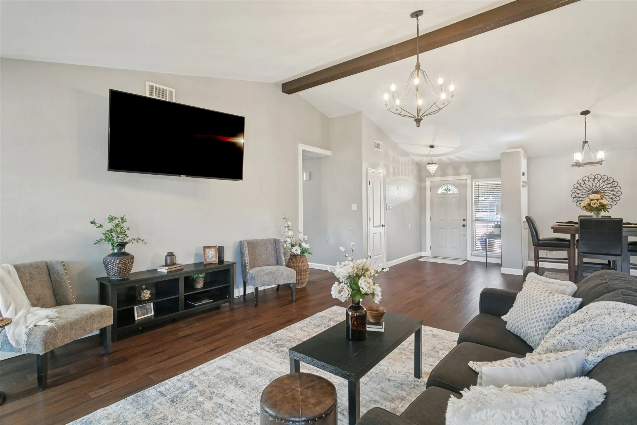 Gorgeous updated lighting fixtures and beautiful hand scraped hickory wood floors.