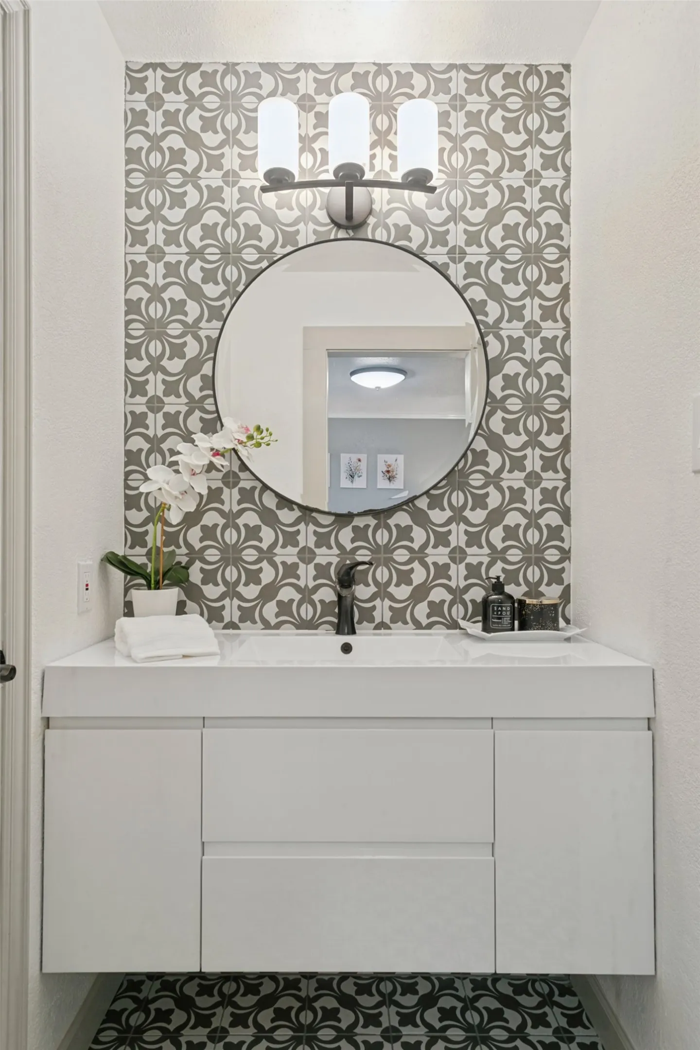 Stunning custom cabinet and tile work.