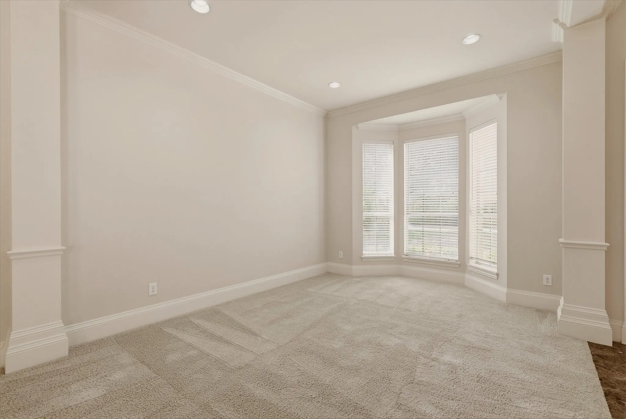 Living Room view with bay window.