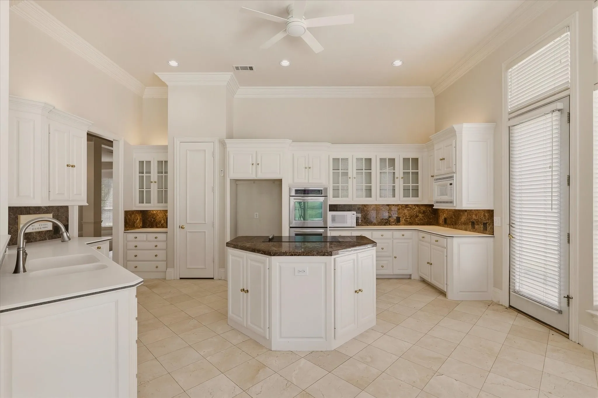 There plenty of room to spread out in this Kitchen