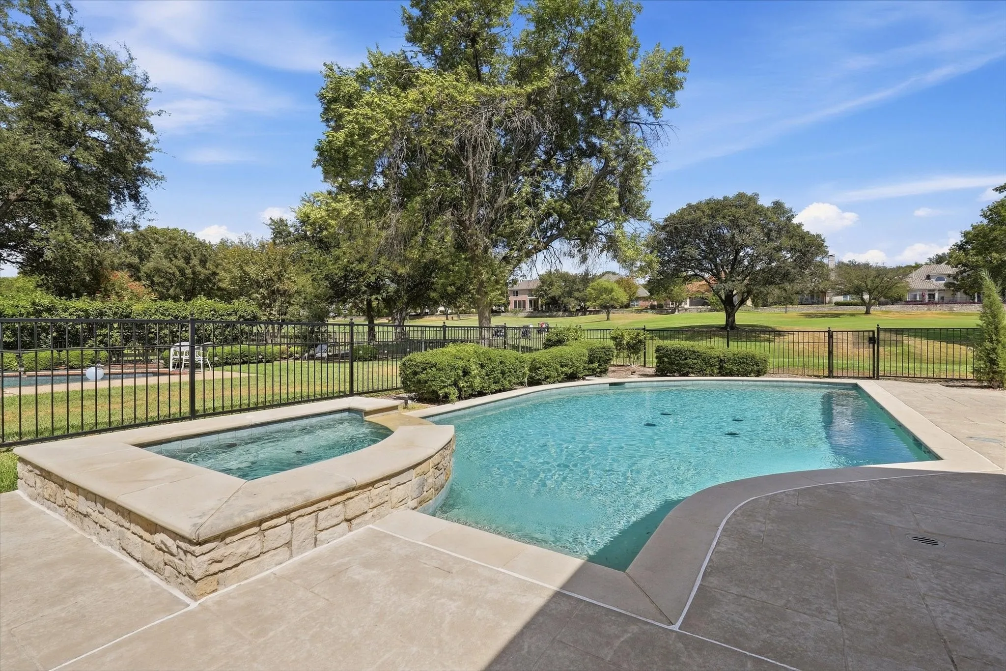 The back yard is resort like with beautiful golf course views and a sparkling pool and spa.