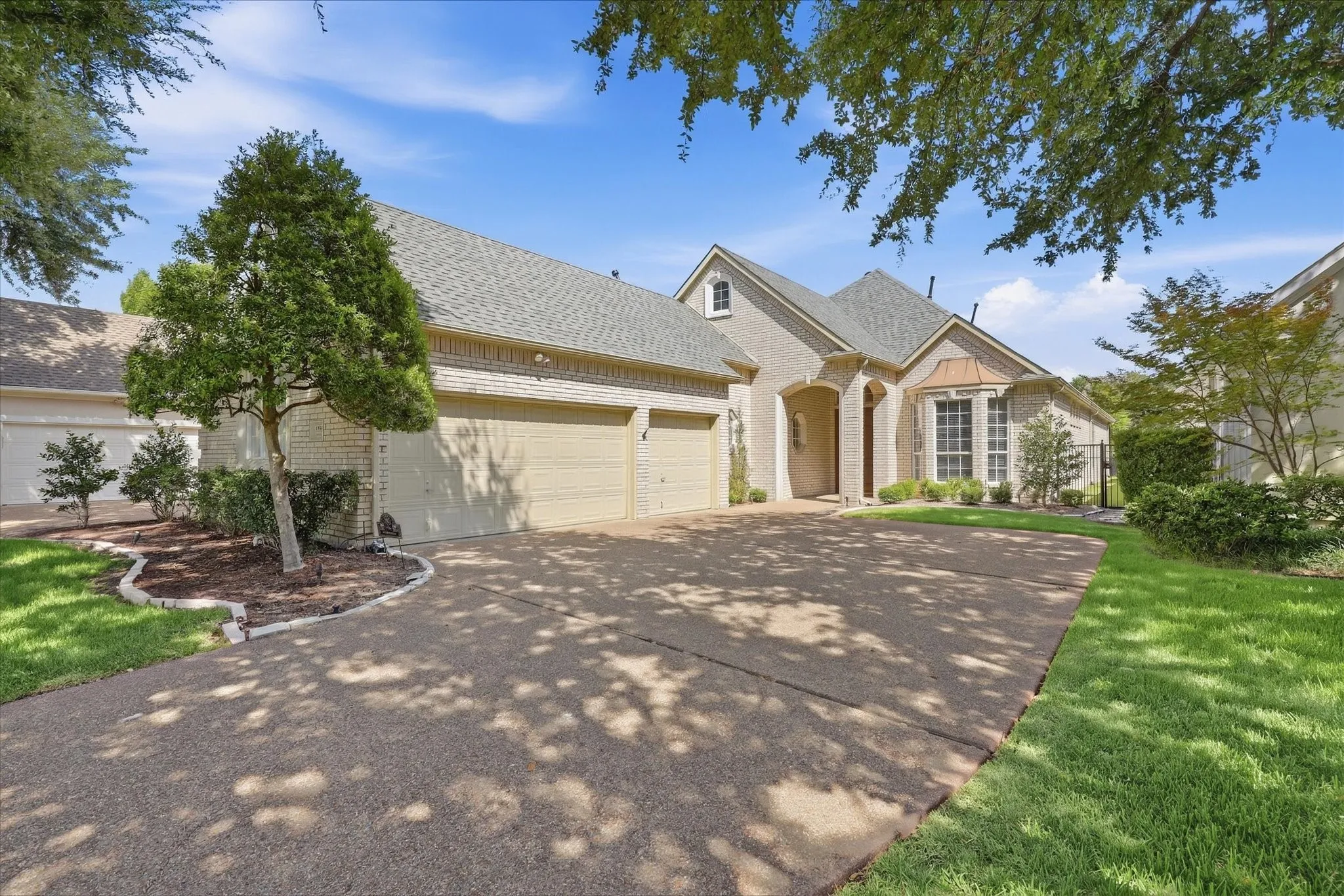 This home is on the golf course and offers a rare 3 car garage.