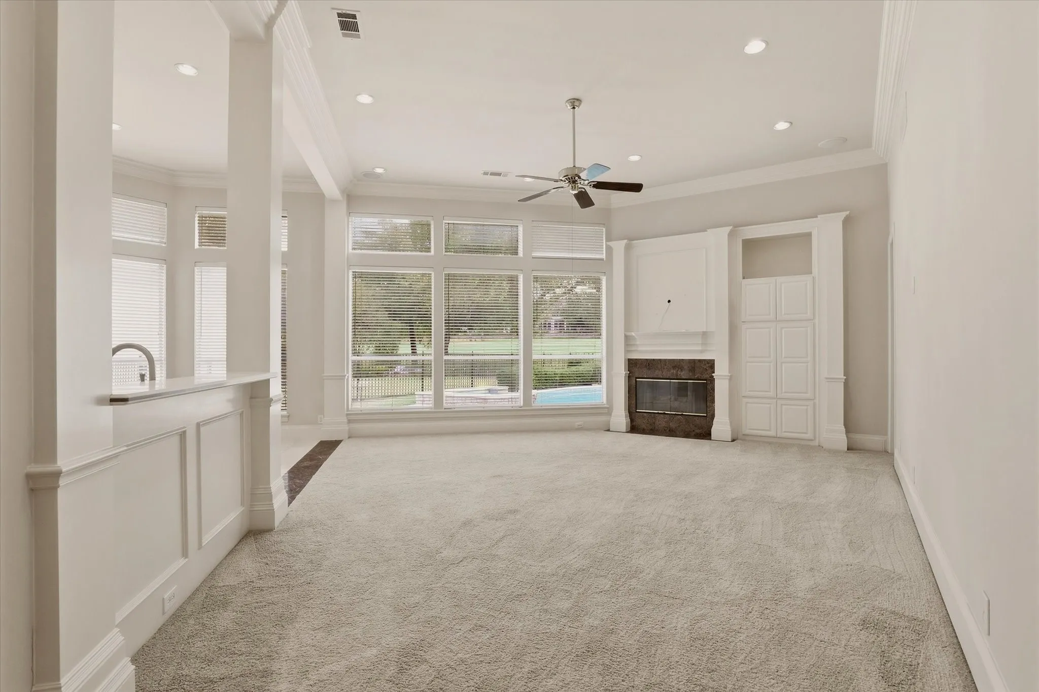 The Family Room offers golf course views, built-ins and a fireplace!