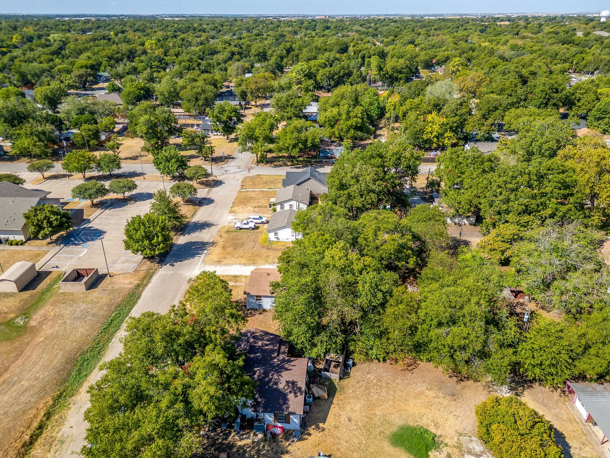 Street views of the property with small church across the street.