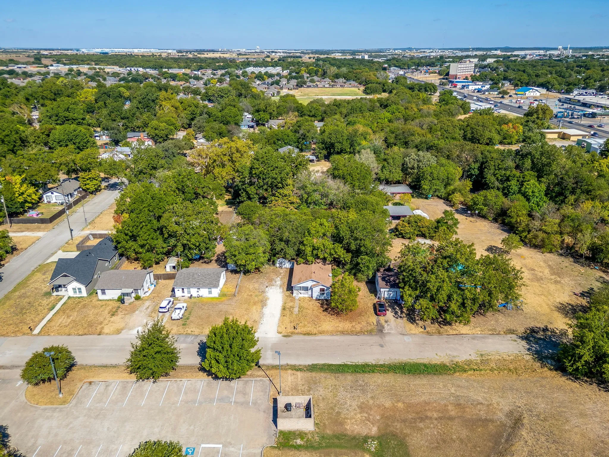 Arial views of the front of the home and cul-de-sac.