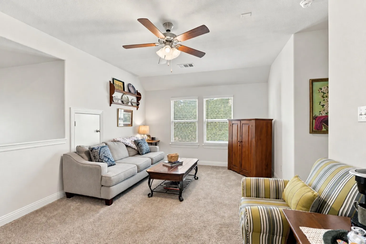 Enjoy this extra space, for work out, homework, TV, play room and more