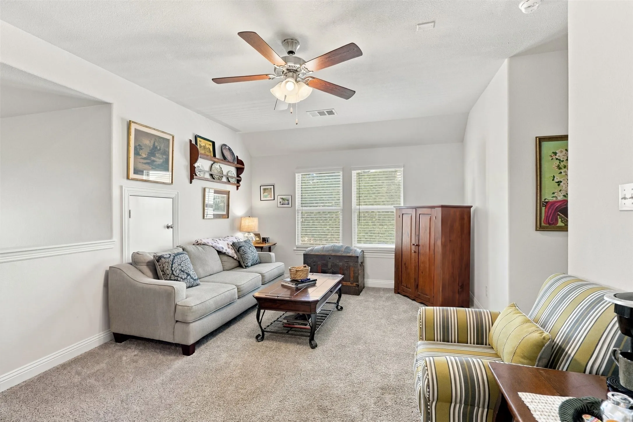 Enjoy this extra space, for work out, homework, TV, play room and more
