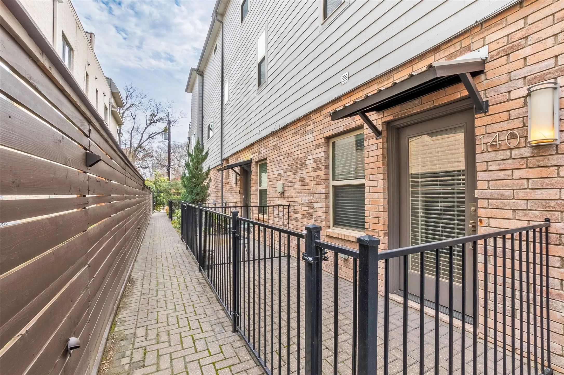 Brick exterior with horizontal siding accents