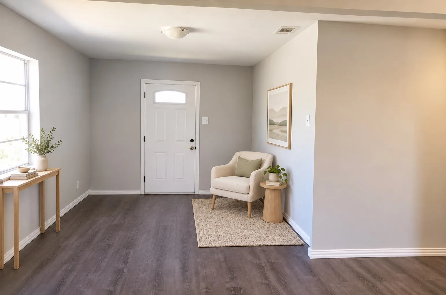 Entryway featuring wood-finish flooring, a contemporary white door with a clear glass insert, and a flush-mount ceiling light. Virtually staged.