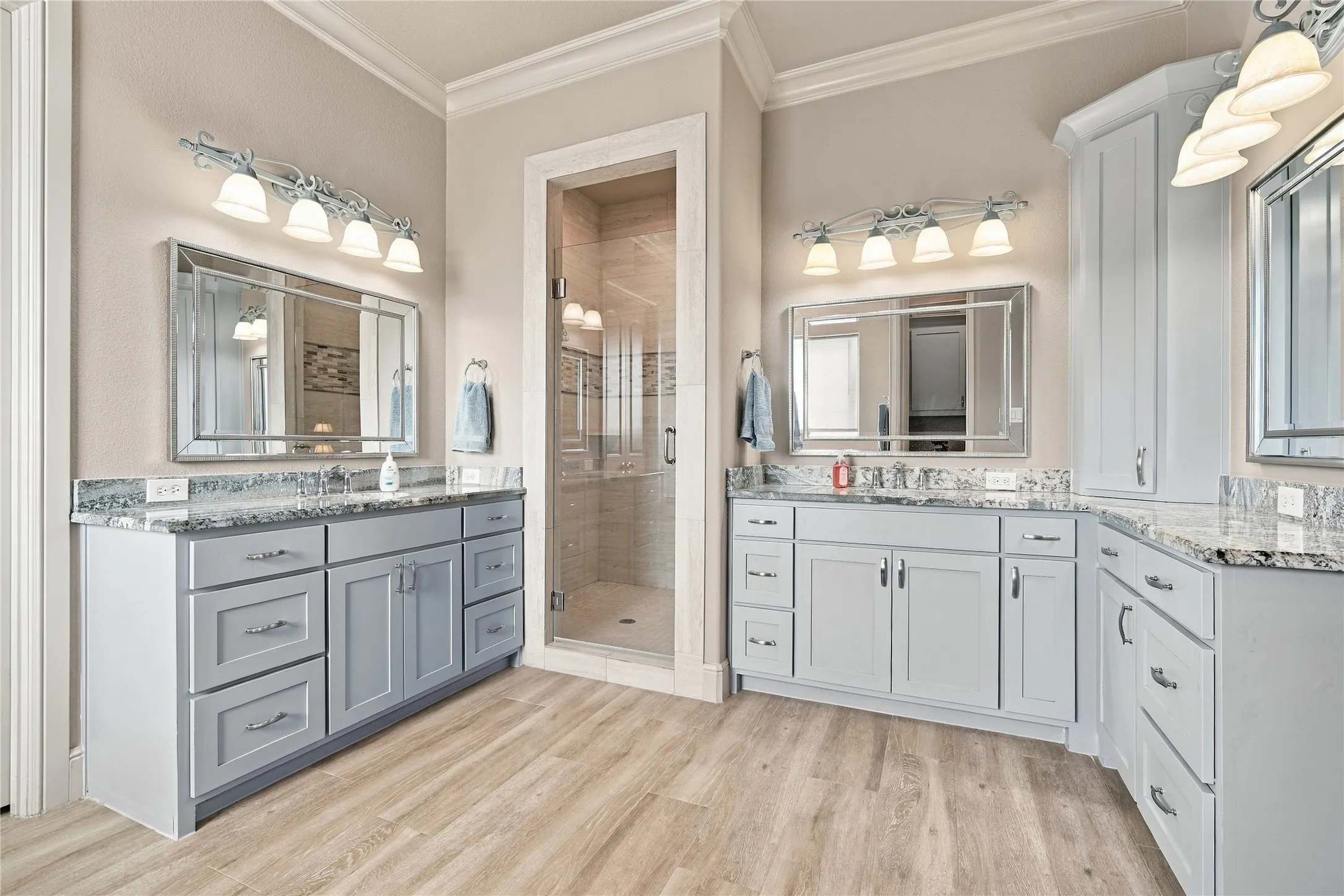 Another angle of the spacious primary bath, designed with two full vanities for easy morning routines.