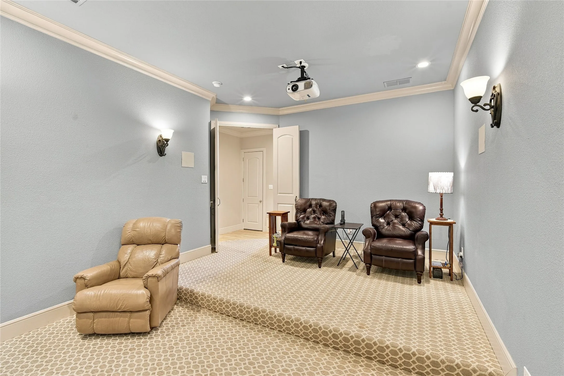 Plenty of room for a full theater setup or game-day gathering in this flexible media space.