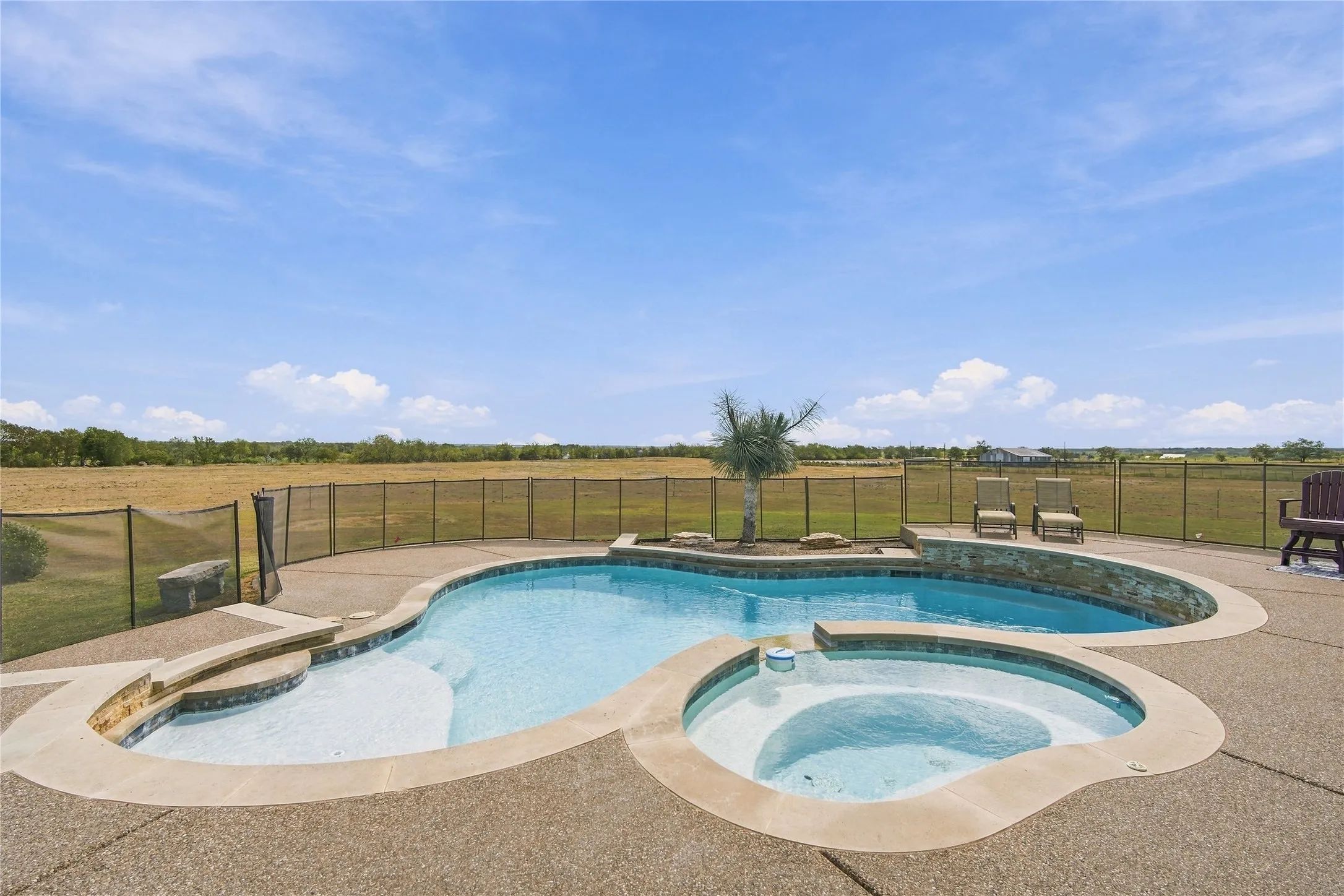 Fully fenced for privacy, this resort-style pool and spa is a blank canvas for pool parties, quiet soaks, or lazy summer days, endless possibilities right in your own backyard.