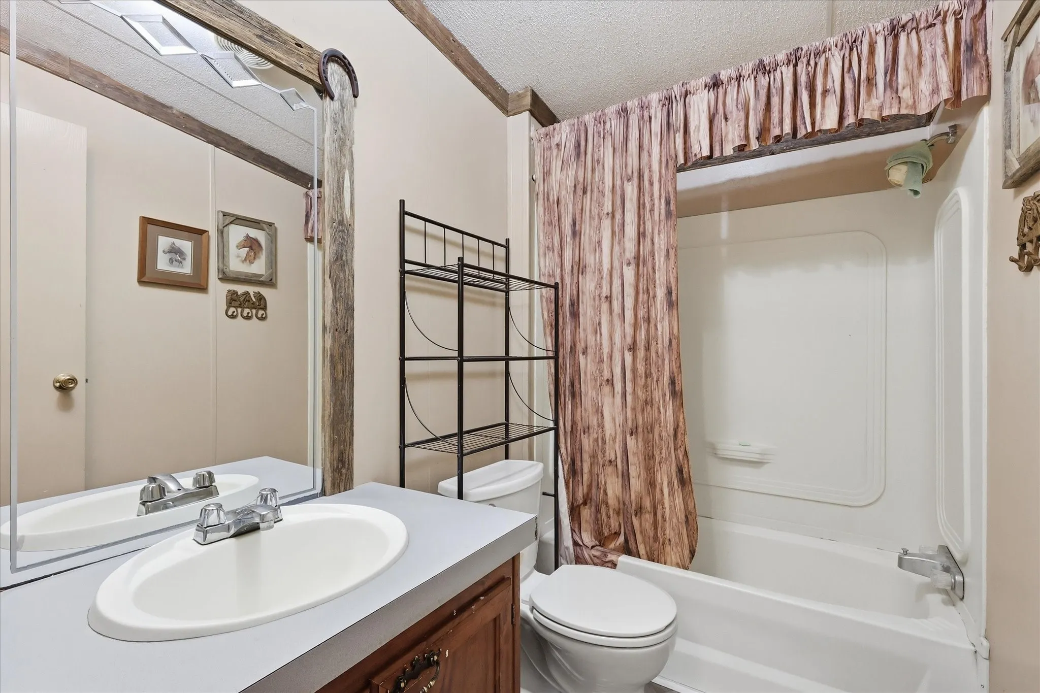 Vanity with a laminate countertop and an integrated sink