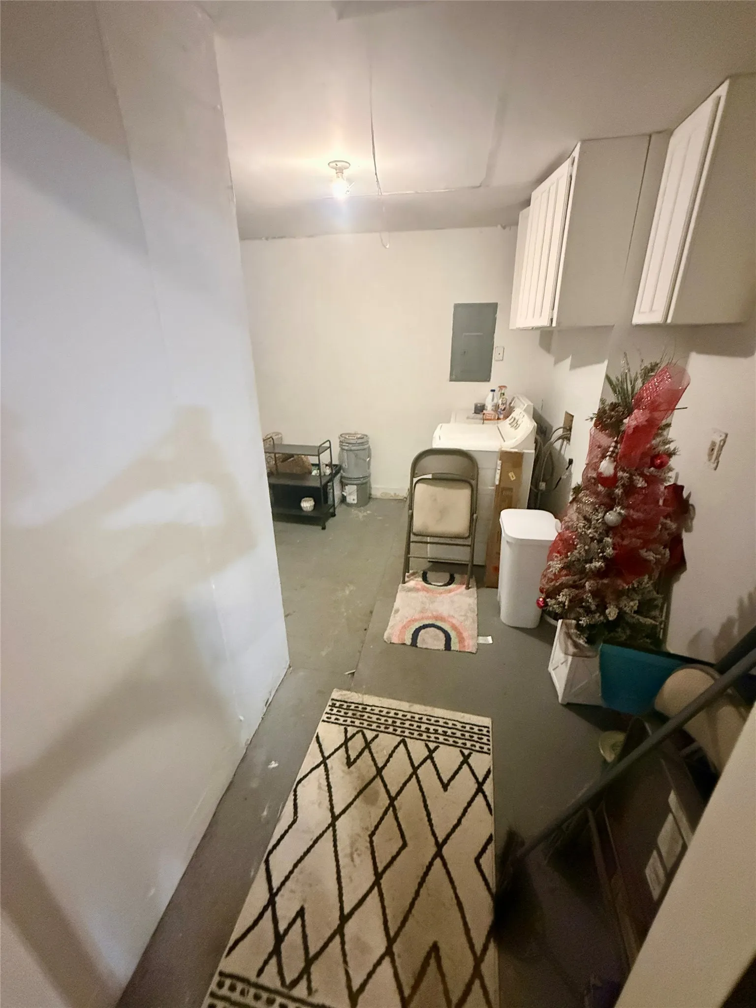 washer and dryer connected in garage - included with sale