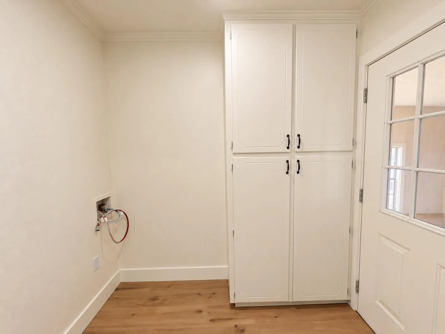 Washer/Dryer hookup with storage. Entry to attached garage.