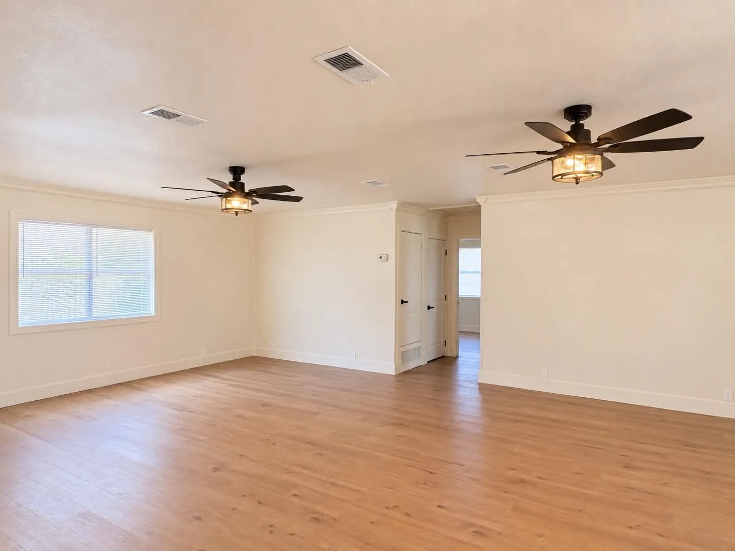 Here's that same room, no furniture! Huge, open living space. Great for big families.