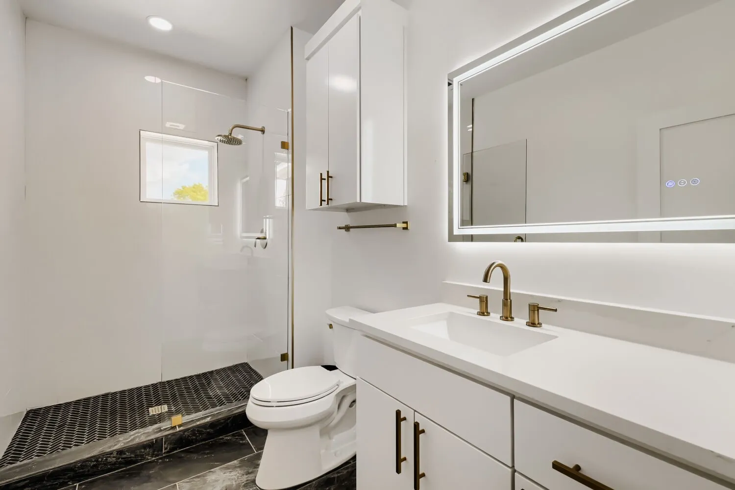 Bathroom with vanity and a walk in shower