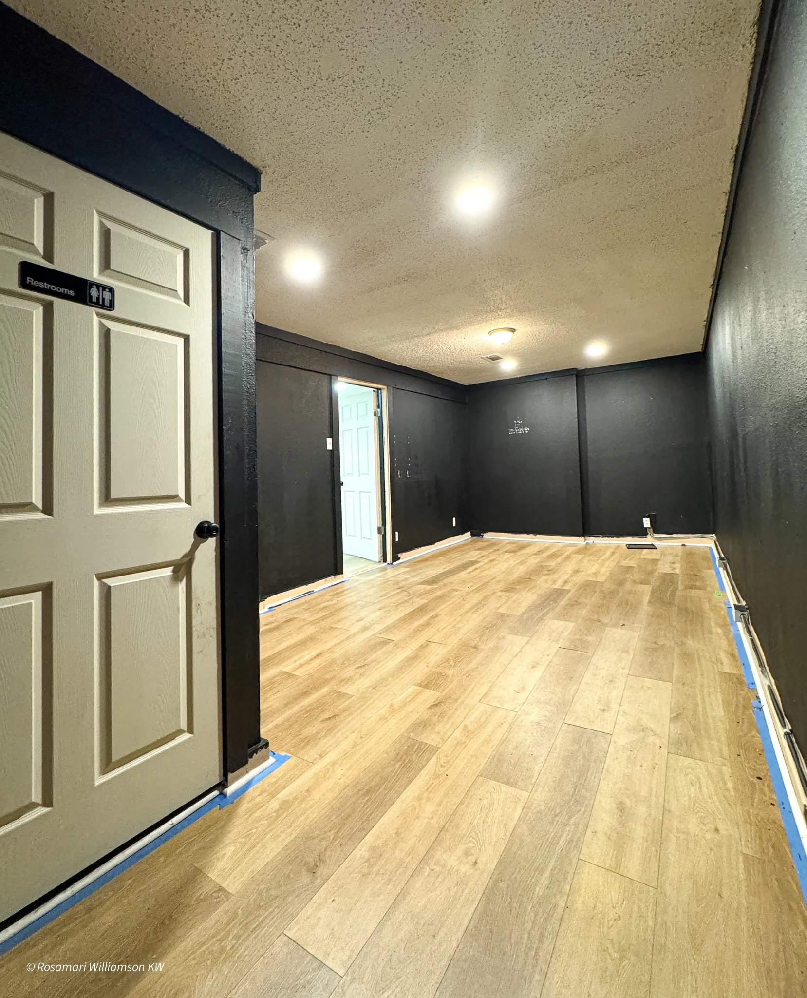 Suite 4. Closed door leads to Restroom