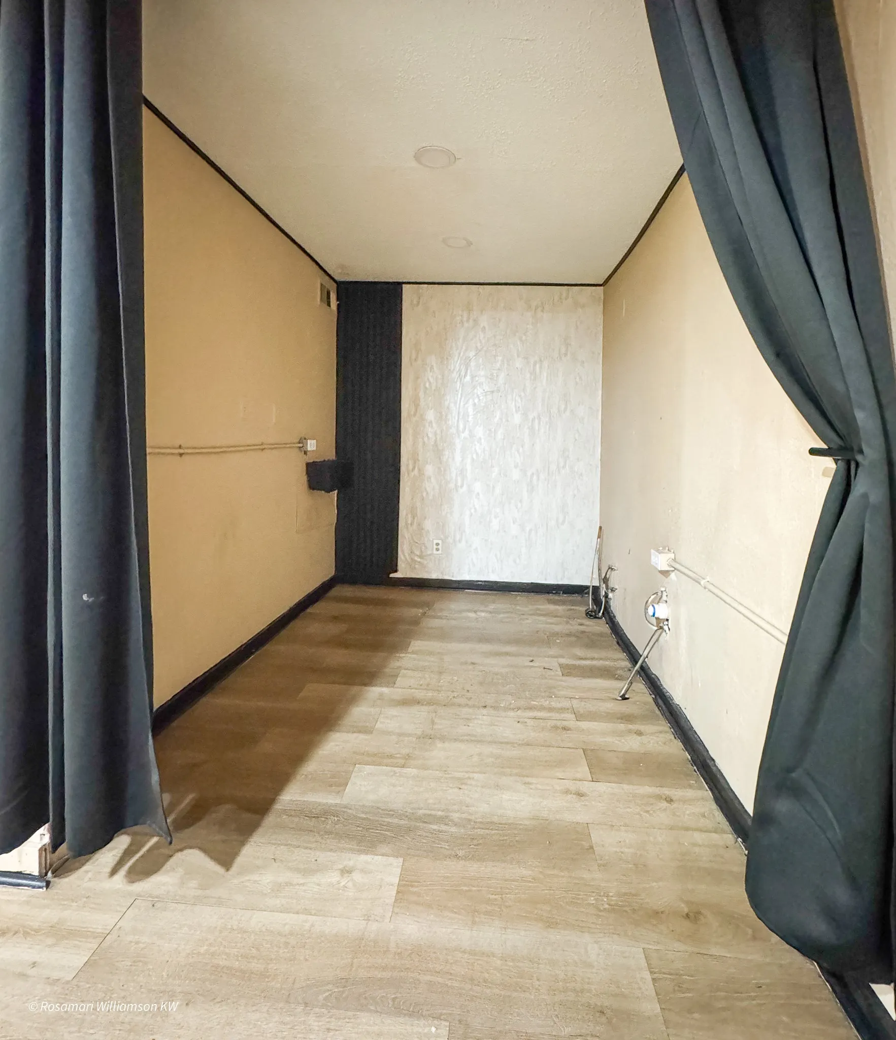 Area may be used for storage or showcasing.