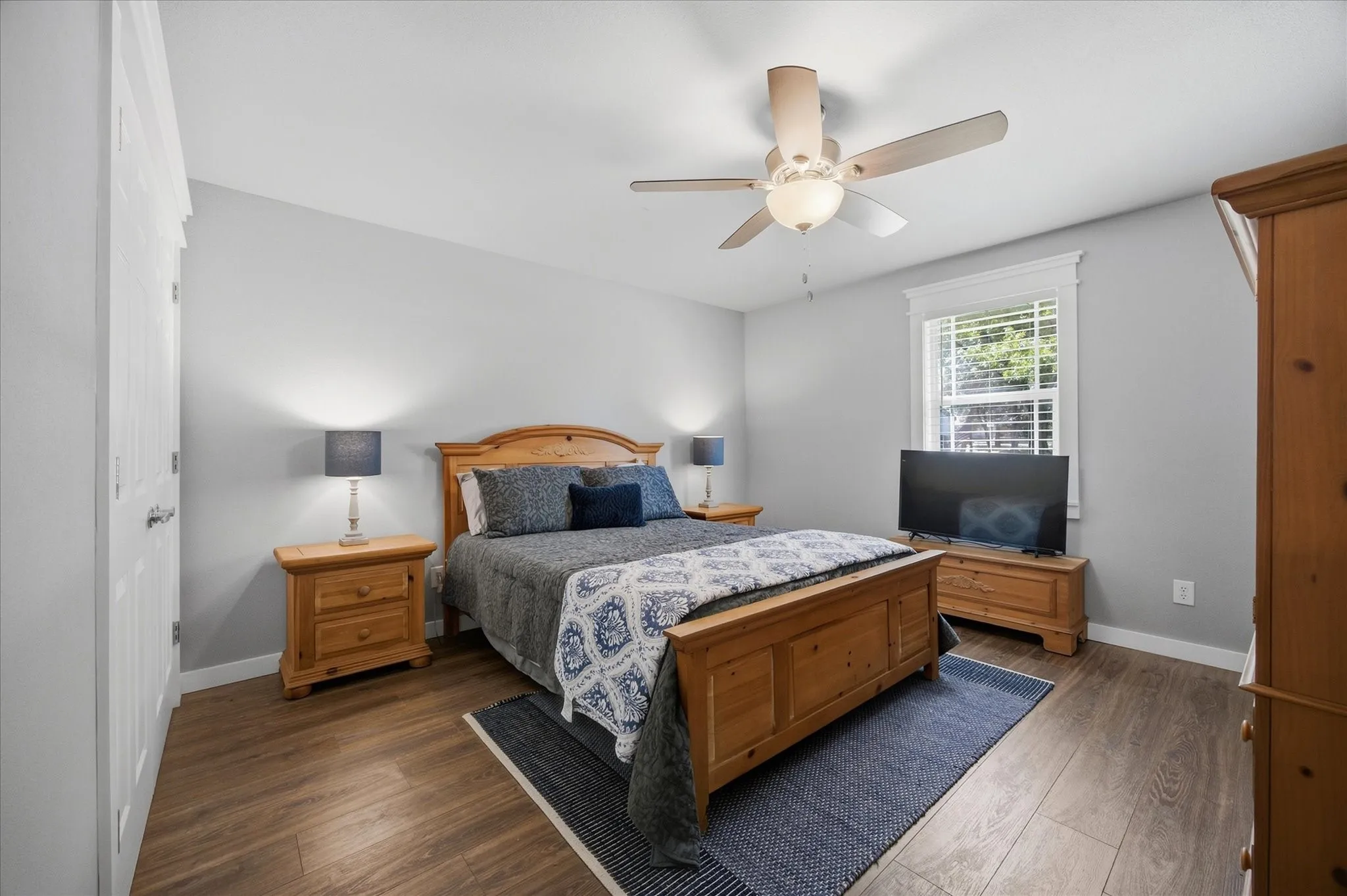 Wood-finish flooring with light gray walls