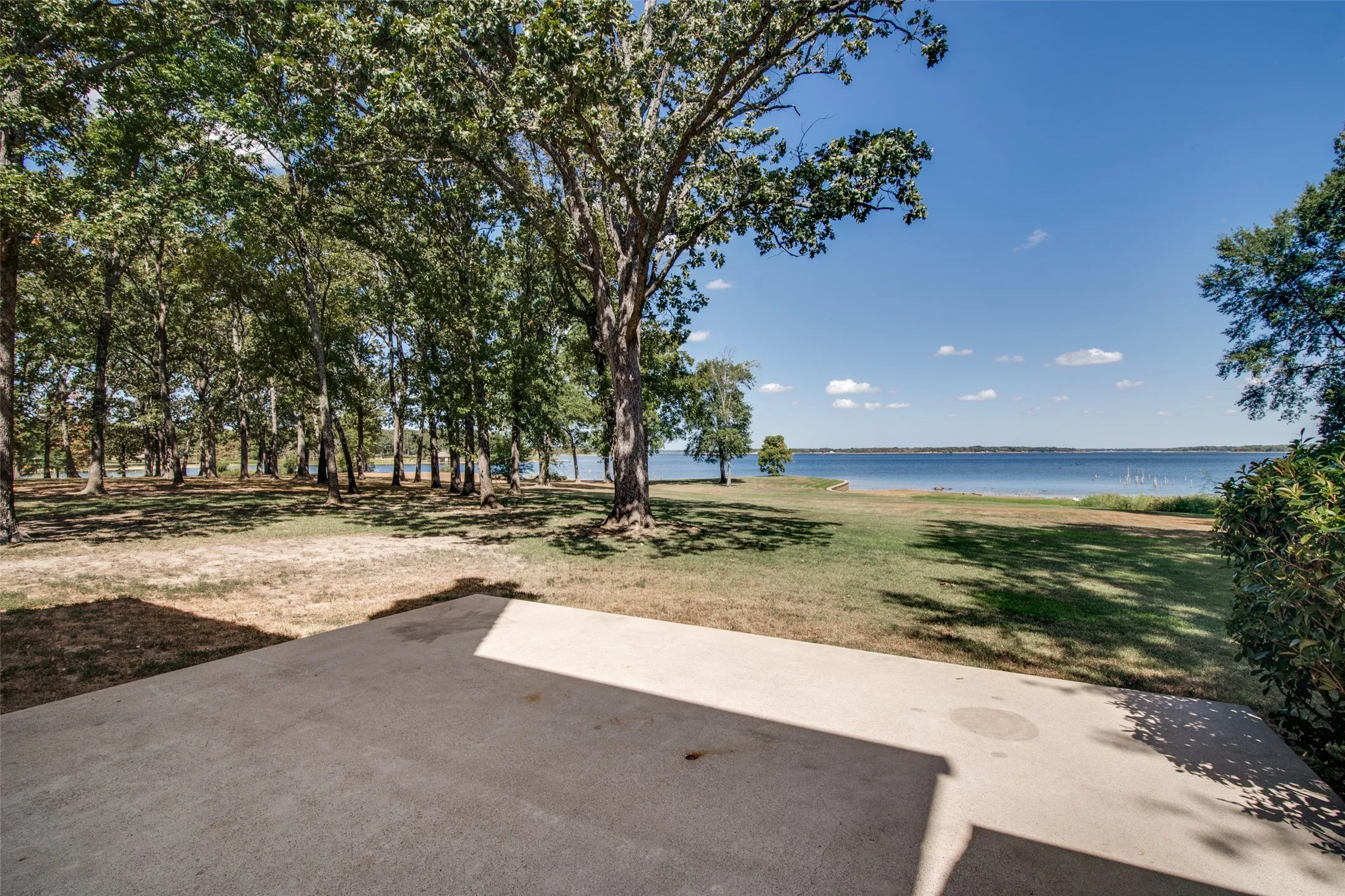 Huge concrete patio overlooking the lake