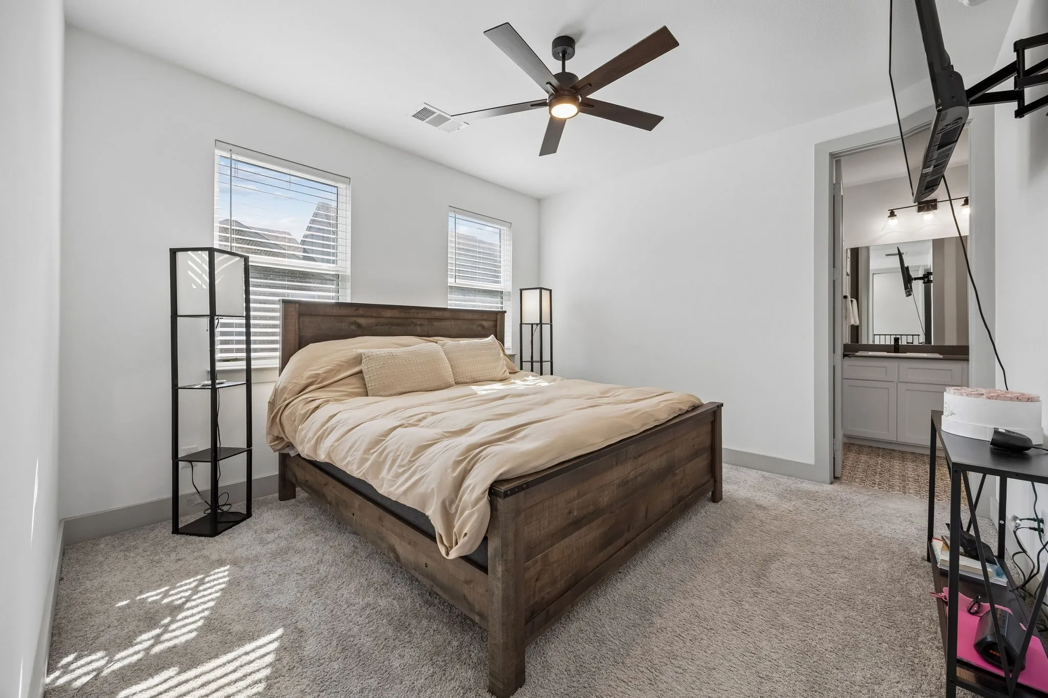 The primary bedroom is on the 3rd floor. It feels spacious and offers an ensuite bath.