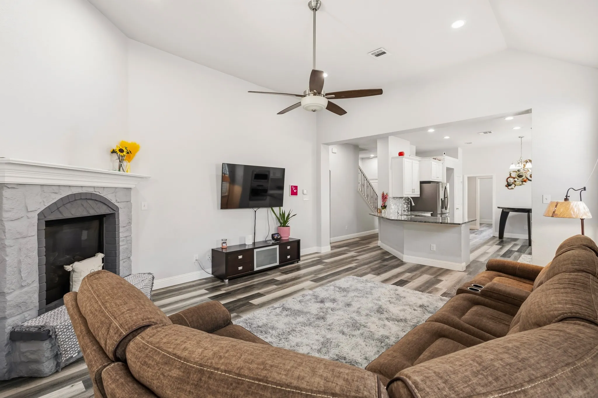 Vaulted ceilings and wood-finish flooring