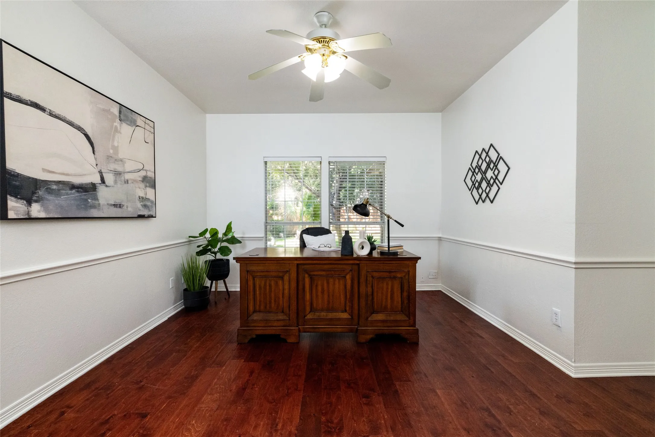 Wood-finish flooring with dual-tone walls and wainscoting