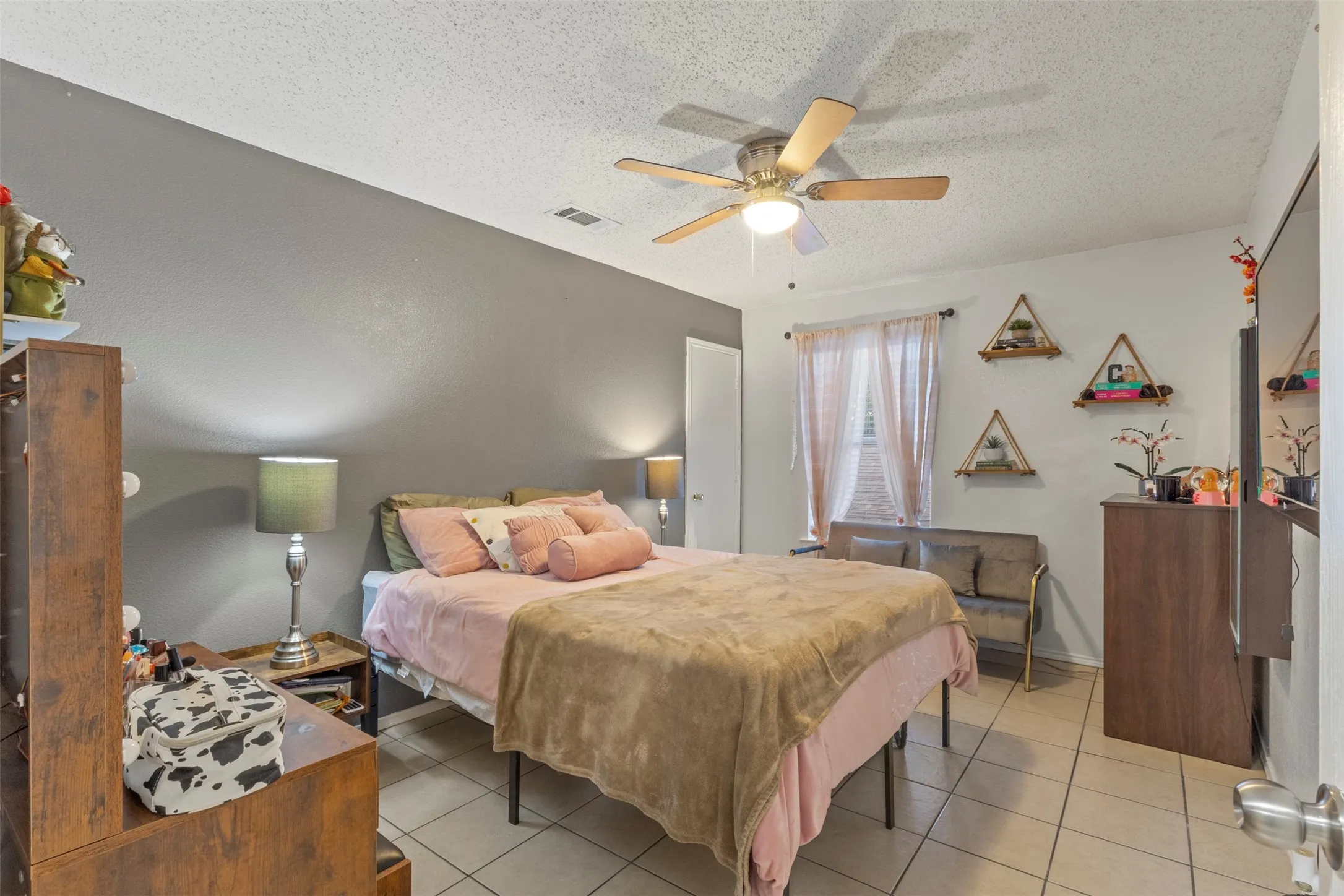 Ceiling fan with integrated lighting, tiled flooring, window with blinds, recessed lighting, and a neutral wall color palette