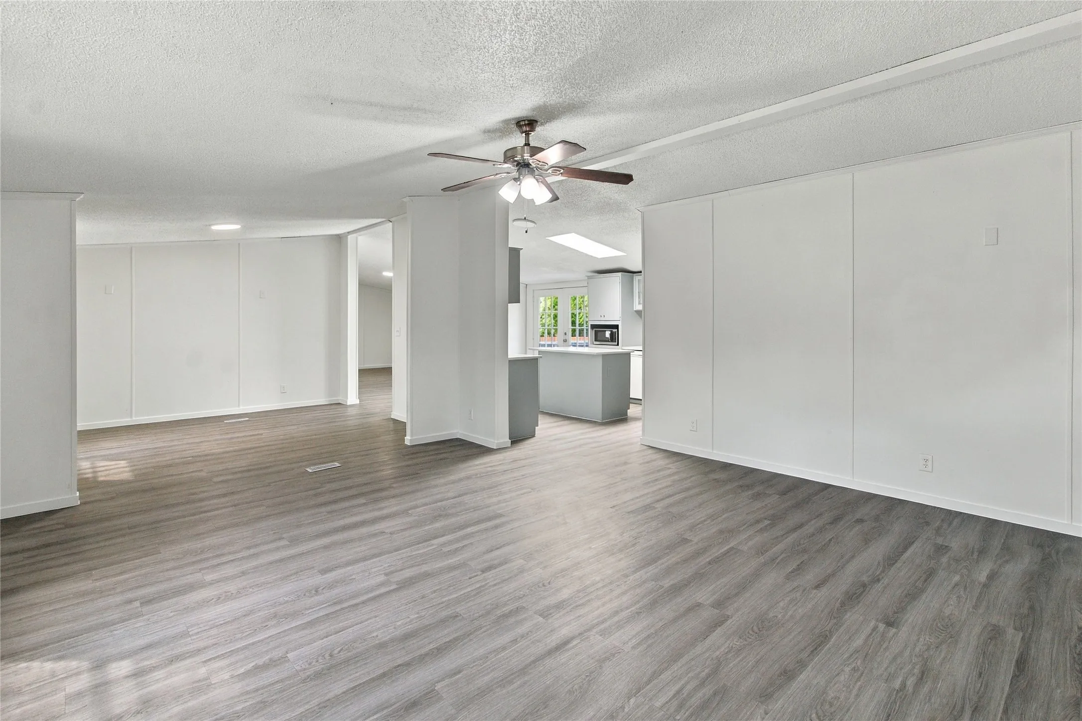 Wood-finish flooring throughout the main living areas