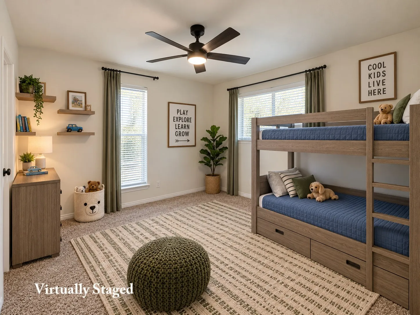 Carpeted room with a ceiling fan, two windows with blinds and drapery, built-in floating shelves, and a wood-finish dresser