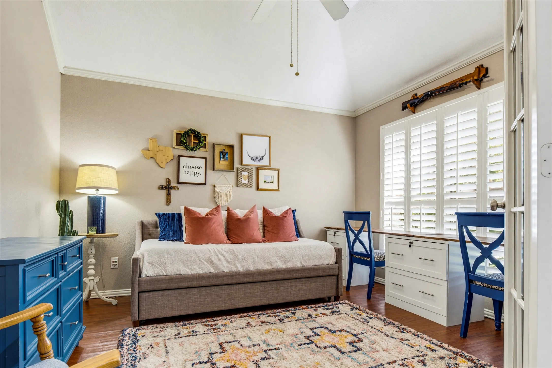 The entry opens to the office with glass-paned french doors.