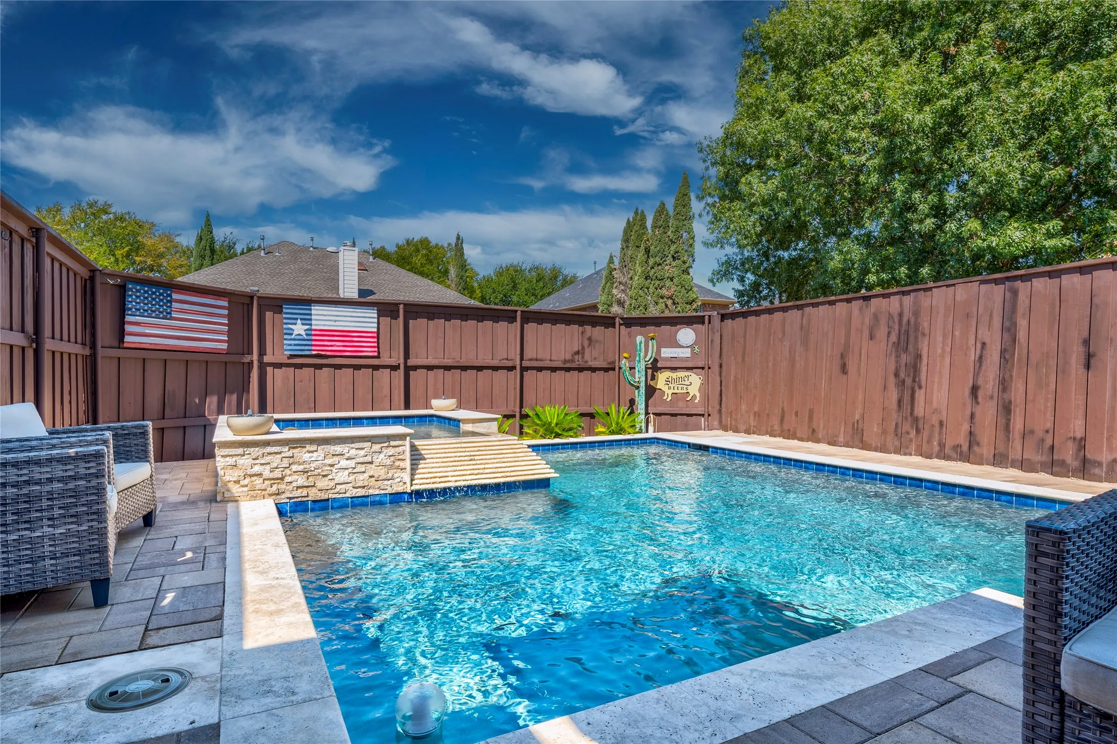 The perfect shape and size pool for this backyard!